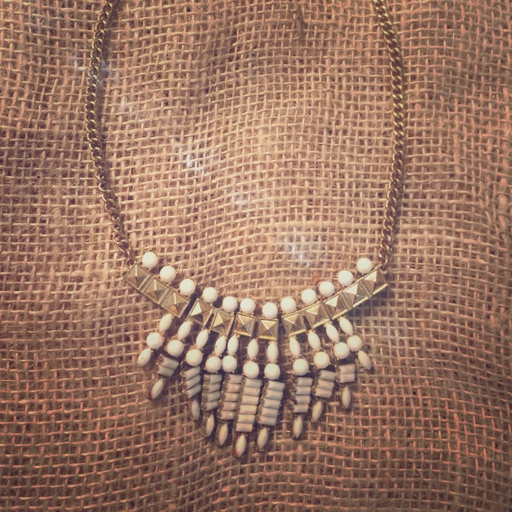 Gold and ivory necklace.